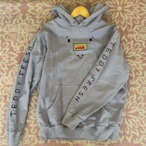 Teddy Fresh size large purple hoodie with embroidered smiley face